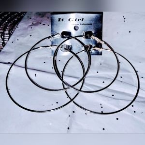 New 2 pairs of large hoop earrings Never worn or taken off packaging.